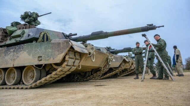 Poland's Military Expansion Relies on Debt and Faces Personnel Shortages