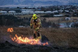 Firefighters Battle Brush Fire Near Elliðavatn in Kópavogur