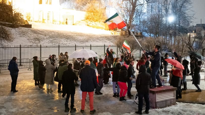 Song and good atmosphere outside Iran's embassy in Oslo
