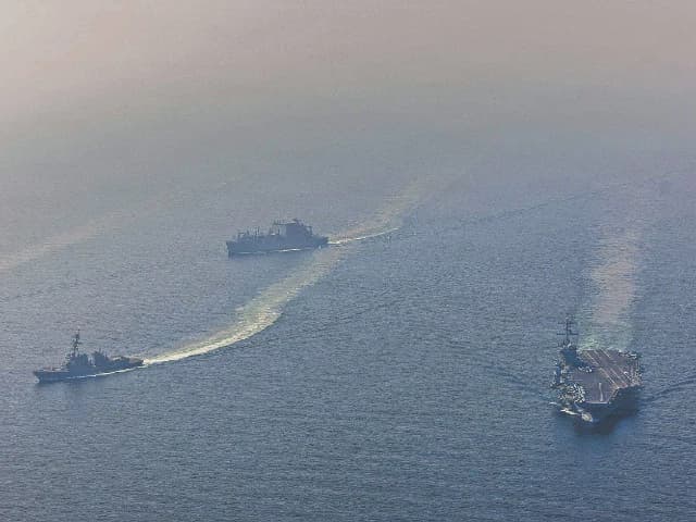 Iran says it targeted US aircraft carrier, state media reports