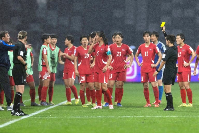 Incensed North Korea briefly refuse to play in bitter Asian Cup loss