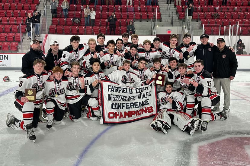 New Canaan defeats Darien for third straight FCIAC hockey championship on Ericson's OT goal