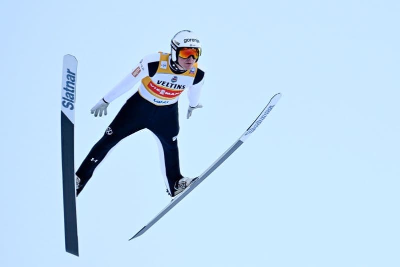 Prevc wins ski jumping men's overall title despite disqualification
