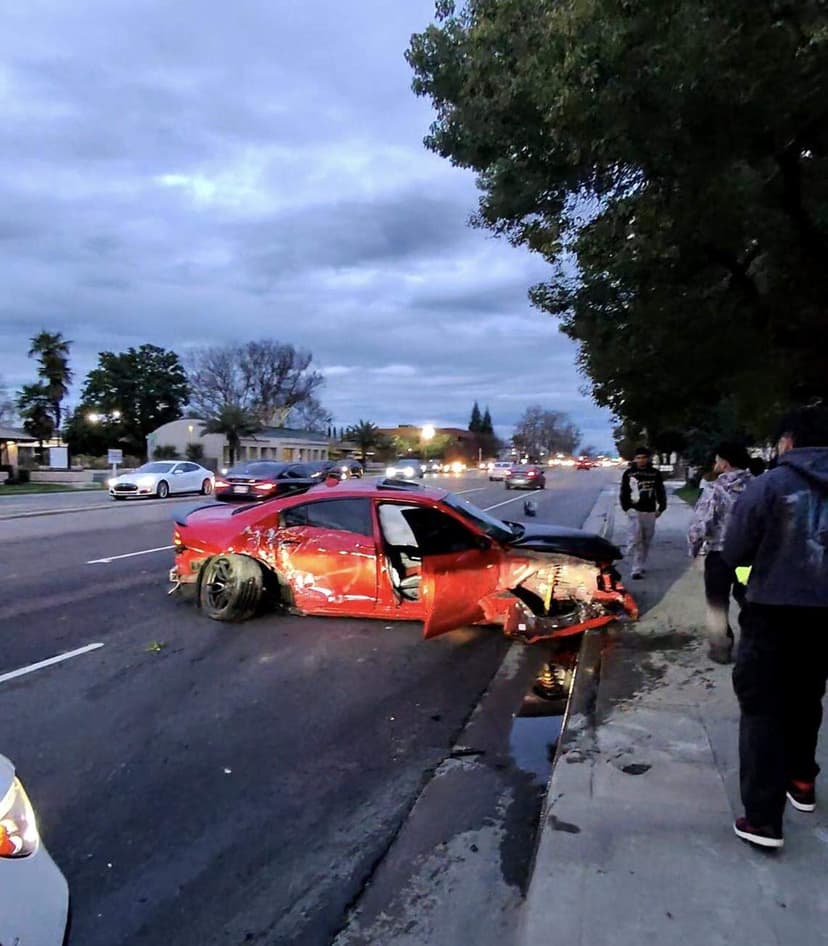 Speeding Hellcat leaves 500-foot path of destruction during crash in Fresno, CHP says