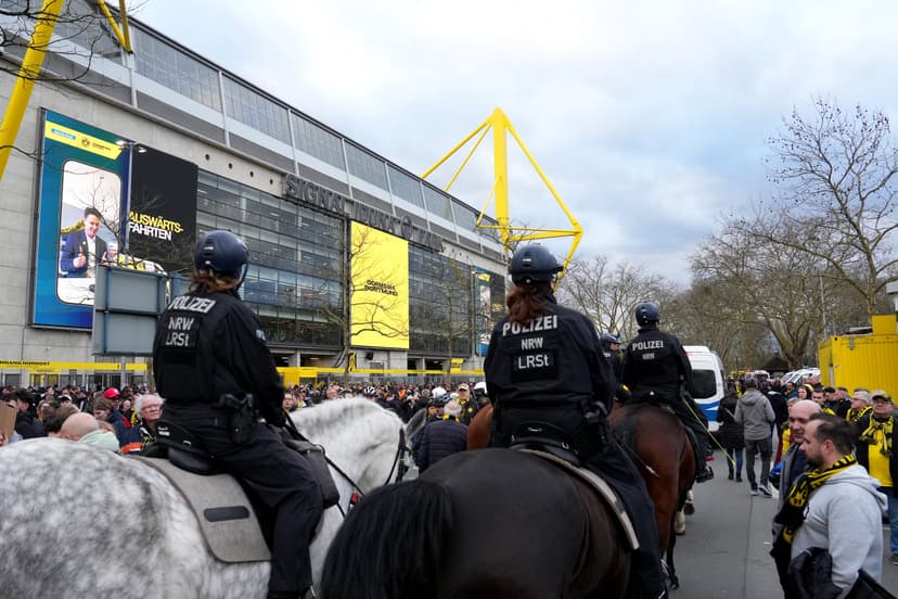 Some 500 Bayern Munich fans boycott Bundesliga match against Borussia Dortmund in protest of police treatment