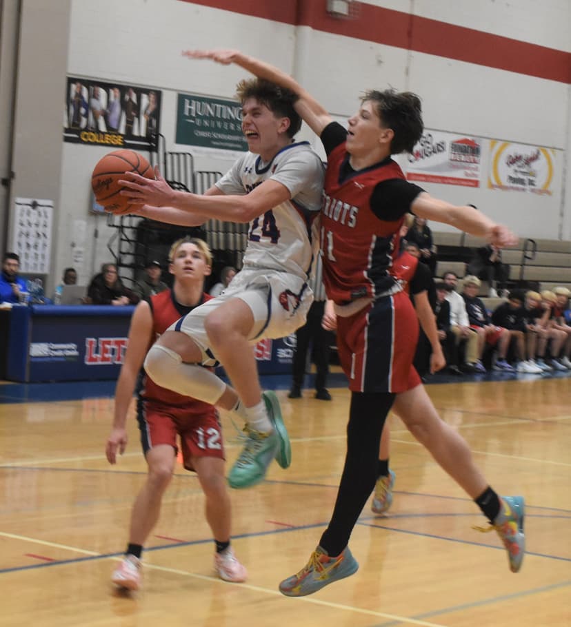 Lenawee Christian boys ride Salenbien effort to district semifinal win