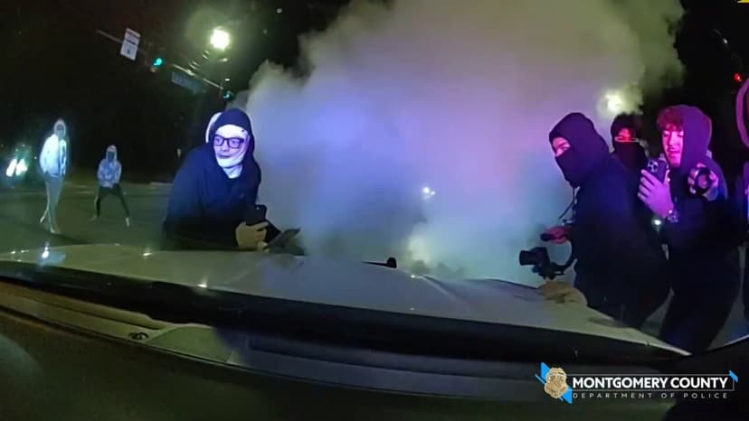 Police cruisers smashed as street takeover mob swarms Maryland road