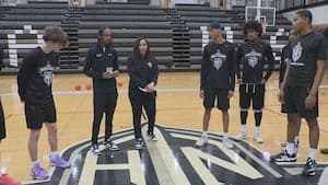 High School Boys Basketball Team Advances in Tournament Under Female Head Coach