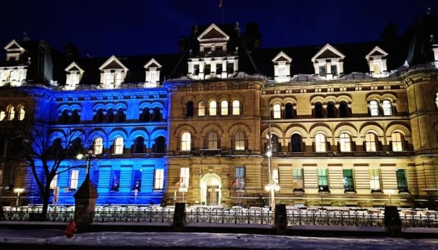 Canada’s Parliament lit up in blue and yellow as sign of solidarity with Ukraine