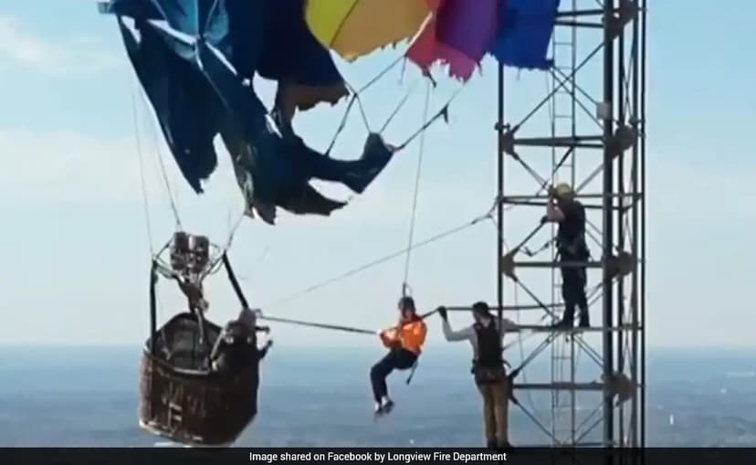 Hot air balloon hits tower in US, leaving two dangling