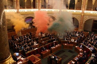 Hungarian Opposition MPs Face Charges for Smoke Bomb Protest