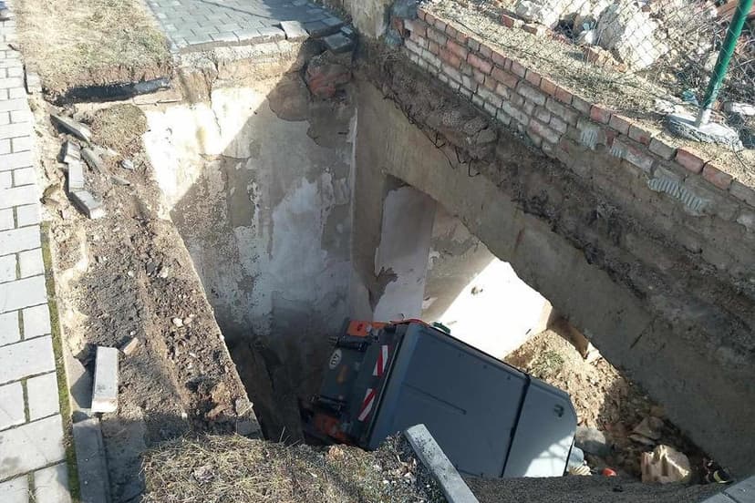 Sweeper truck falls into cellar in Brno, Czech Republic