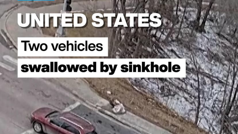 Sinkhole Swallows Two Cars at Busy Intersection in Omaha, US