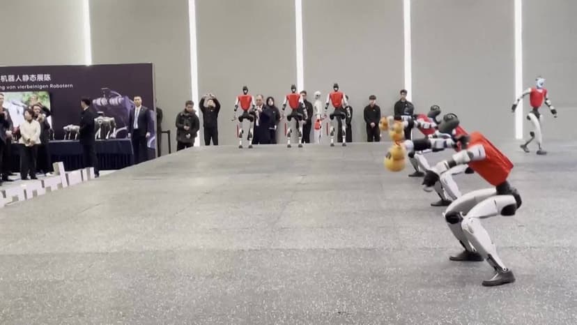 German Chancellor Visits China, Welcomed by Robots