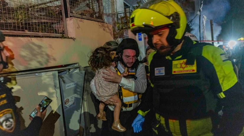 Woman killed and 20 injured in Iranian missile strike on Tel Aviv – video